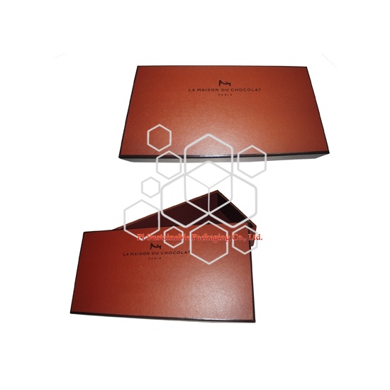 Une boîte de emballage confiseries pour chocolat vide carré, avec des moyens naturels, pour montrer et protéger ton cadeau d'amour. Une boîte de emballage confiseries pour chocolat vide carré, avec des moyens naturels, pour montrer et protéger ton cadeau d'amour.